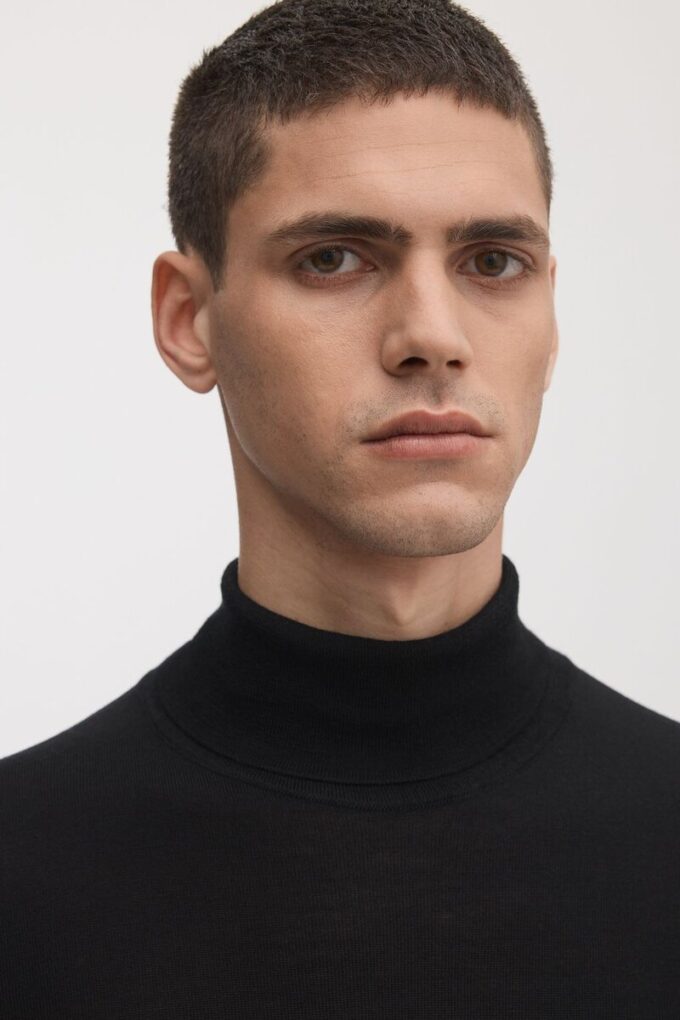 The Merino Roll Neck The Merino Roll Neck